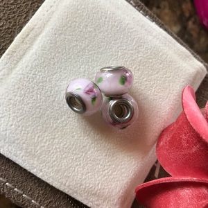 Three bracelet charms